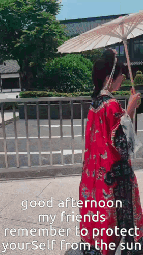 A Woman In A Red Kimono Is Holding An Umbrella And Says Good Afternoon My Friends GIF