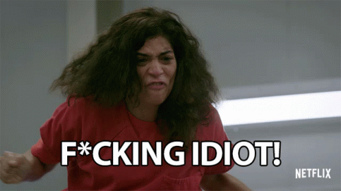 A Woman In A Red Shirt Says Fucking Idiot GIF