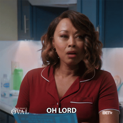 A Woman In A Red Shirt That Says Oh Lord On It GIF