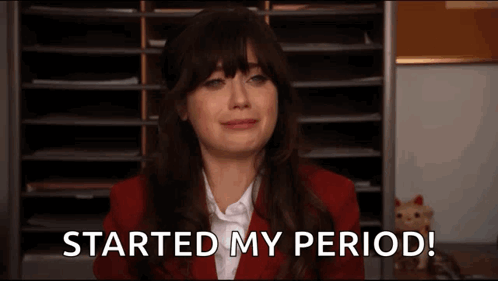 A Woman In A Red Suit Is Crying With The Words Started My Period Behind Her GIF