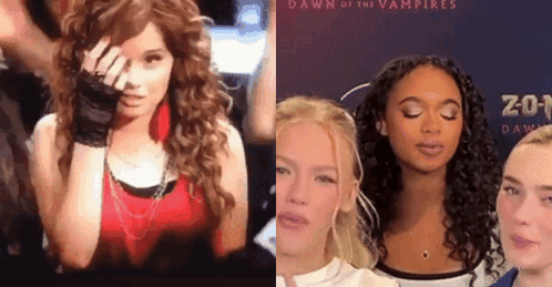 A Woman In A Red Top Is Standing Next To Another Woman In Front Of A Dawn Of The Vampires Poster GIF