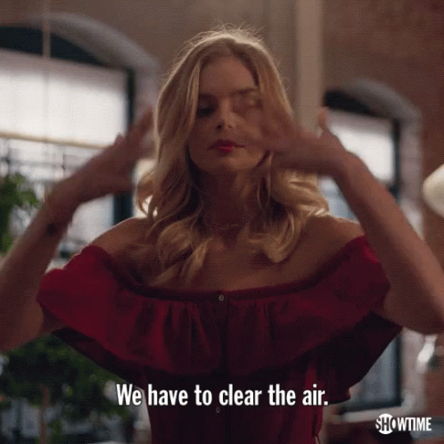 A Woman In A Red Top Says We Have To Clear The Air GIF