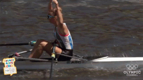 A Woman In A Rowing Boat With The Olympic Channel Logo GIF