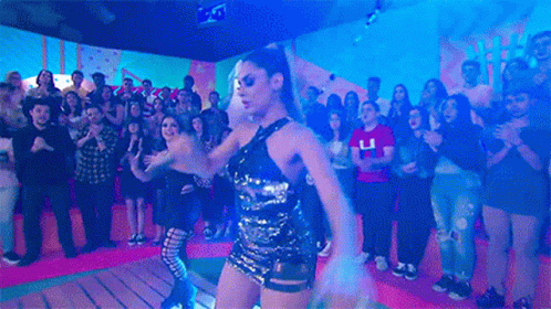 Woman In Sequin Dress Dancing At Party GIF
