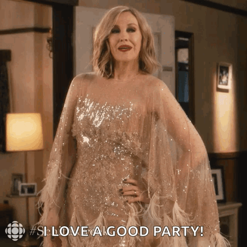 A Woman In A Sequined Gown Says " Love A Good Party " GIF