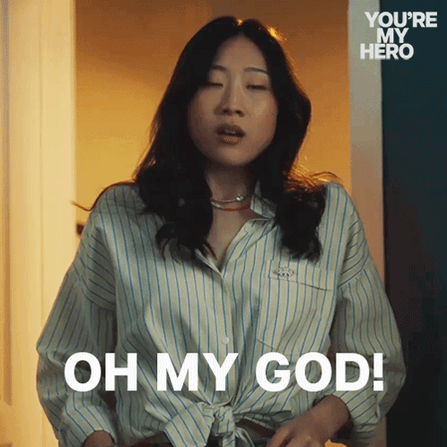 A Woman In A Striped Shirt Is Saying " Oh My God " GIF