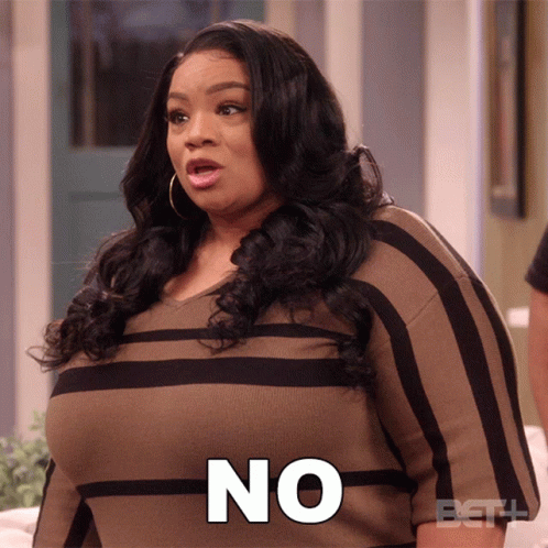 A Woman In A Striped Shirt Says " No " GIF