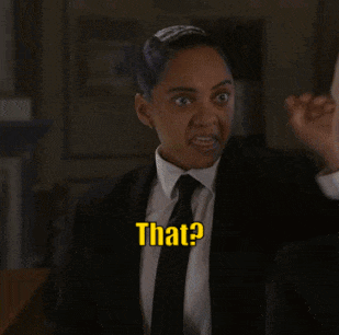 A Woman In A Suit And Tie Is Saying That GIF