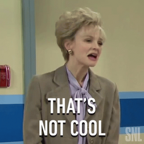 A Woman In A Suit And Tie Is Saying That 'S Not Cool . GIF
