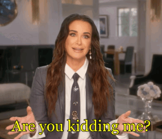 A Woman In A Suit And Tie Says " Are You Kidding Me ? " GIF