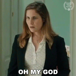 Woman In Suit Saying Oh My God GIF