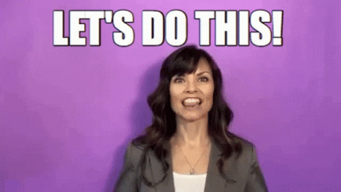 A Woman In A Suit Is Making A Funny Face And Saying `` Let 'S Do This '' . GIF