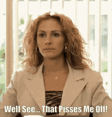 A Woman In A Suit Is Sitting In Front Of A Window And Says Well See That Pisses Me Off GIF
