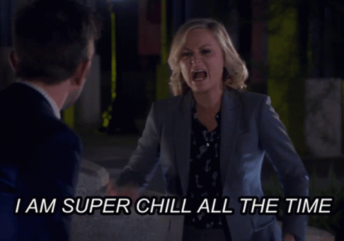A Woman In A Suit Is Yelling At A Man With The Words I Am Super Chill All The Time Below Her GIF