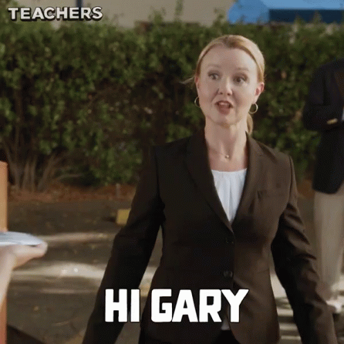 A Woman In A Suit Says Hi Gary In White Letters GIF