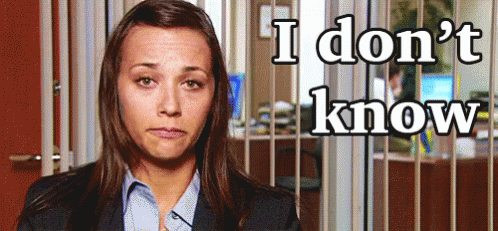 A Woman In A Suit Says I Don T Know GIF