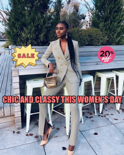 A Woman In A Suit Sits On A Stool With The Words Chic And Classy This Women 'S Day On The Bottom GIF