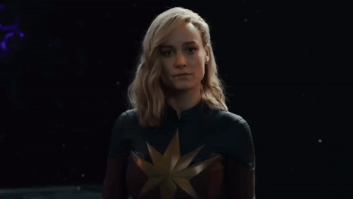 A Woman In A Superhero Costume Says Wanna Fight . GIF