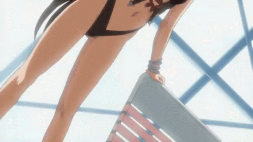 A Woman In A Swimsuit Is Standing On A Chair GIF