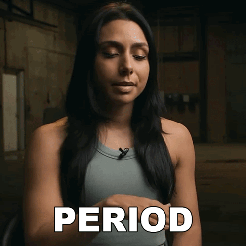 A Woman In A Tank Top With The Word Period Written In White GIF
