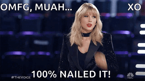 A Woman In A Tuxedo With The Words Omfg Muah 100 % Nailed It On The Bottom GIF
