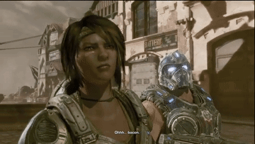 A Woman In A Video Game Is Talking To A Man In A Gears Of War Video Game GIF