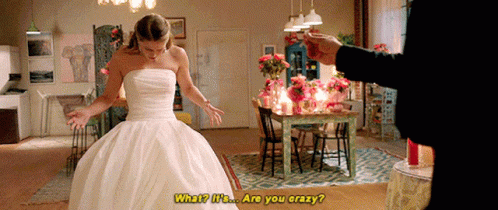 A Woman In A Wedding Dress Says " What I 'M ... Are You Crazy " GIF