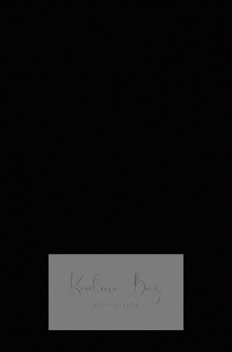 A Woman In A Wedding Dress Sits On A Couch With The Name Karolina Berry Written On The Bottom GIF
