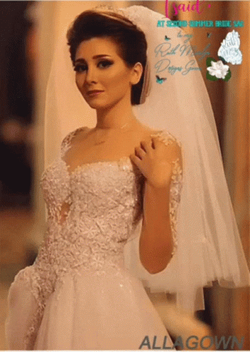 A Woman In A Wedding Dress With A Veil And The Words " Bride " On The Bottom GIF