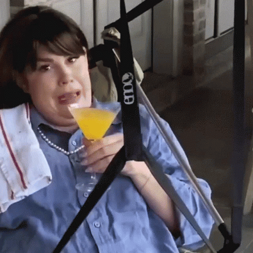 Woman In Wheelchair Drinking Etoo Martini GIF
