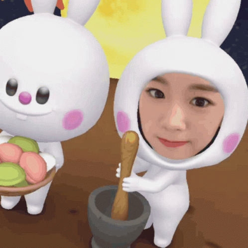 Woman In Bunny Costume Holding Mortar And Pestle GIF