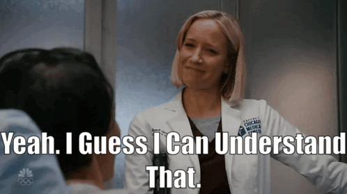 A Woman In A White Coat With The Words Yeah I Guess I Can Understand That GIF
