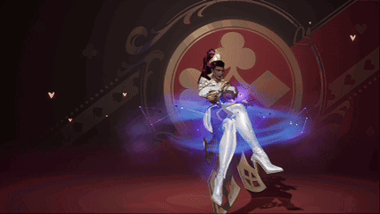 A Woman In A White Costume Is Standing In Front Of A Playing Card Symbol GIF