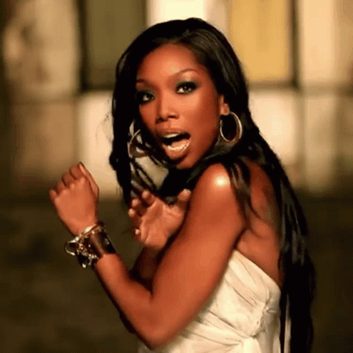 Woman In White Dress Making Funny Face GIF