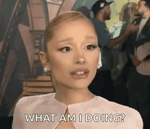 A Woman In A White Dress Is Asking What Am I Doing ? GIF