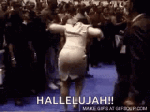 A Woman In A White Dress Is Dancing In Front Of A Crowd With The Words Hallelujah On The Bottom . GIF