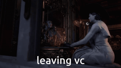 A Woman In A White Dress Is Looking At Her Reflection In A Mirror With The Words Leaving Vc Above Her GIF
