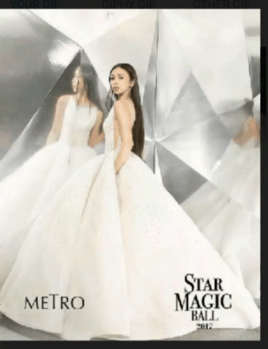 A Woman In A White Dress Is On The Cover Of The Star Magic Ball Magazine GIF