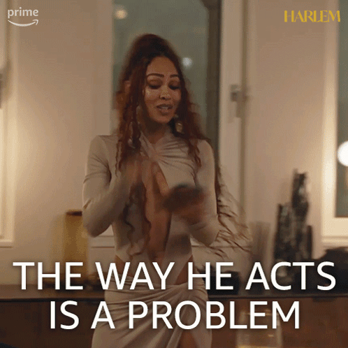 A Woman In A White Dress Says The Way He Acts Is A Problem While Looking At Her Phone GIF
