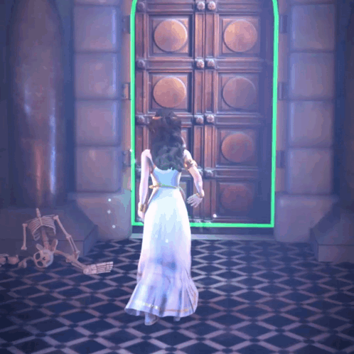 A Woman In A White Dress Standing In Front Of A Door GIF