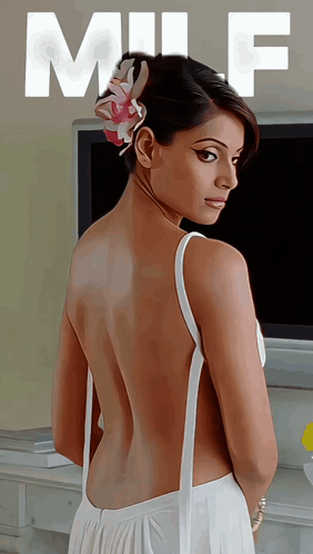 A Woman In A White Dress With A Flower In Her Hair Stands In Front Of A Tv With The Word Milf On The Bottom GIF