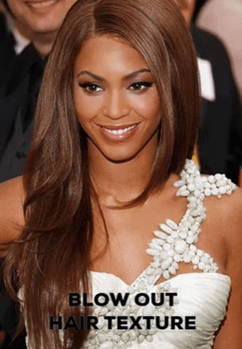 A Woman In A White Dress With Blow Out Hair Texture Written On The Bottom GIF