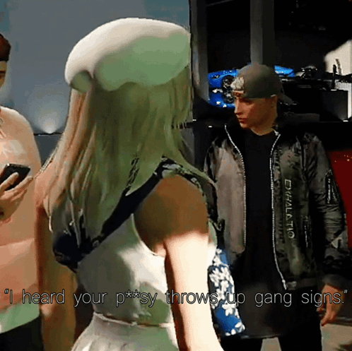 A Woman In A White Hat Says " I Heard Your P ** Sy Throws Up Gang Signs " GIF