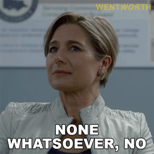 A Woman In A White Jacket Says " None Whatsoever, No " GIF