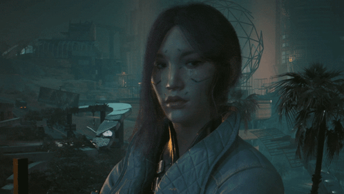 A Woman In A White Jacket Stands In A Dark Room GIF