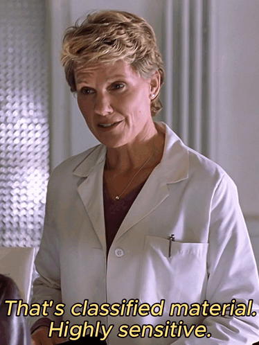 A Woman In A White Lab Coat Says That 'S Classified Material GIF