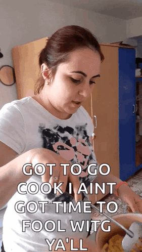 A Woman In A White Shirt Is Cooking And Says Got To Go Cook I Aint GIF