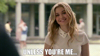 A Woman In A White Shirt Is Smiling And Saying `` Unless You 'Re Me ... '' GIF
