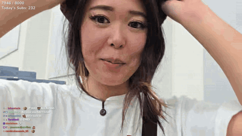 A Woman In A White Shirt With Today 'S Subs 232 On The Bottom Right GIF