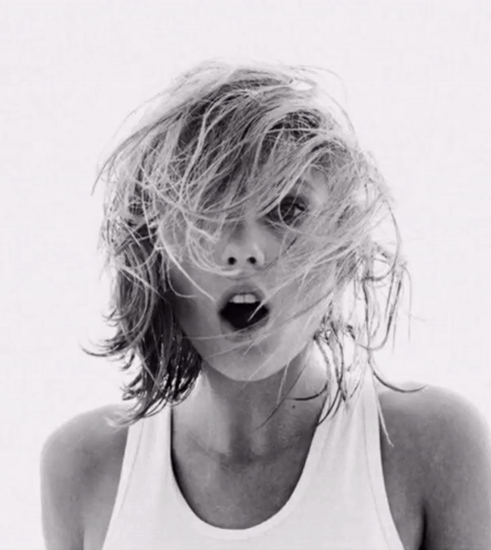 Woman In White Tank Top With Mouth Open GIF